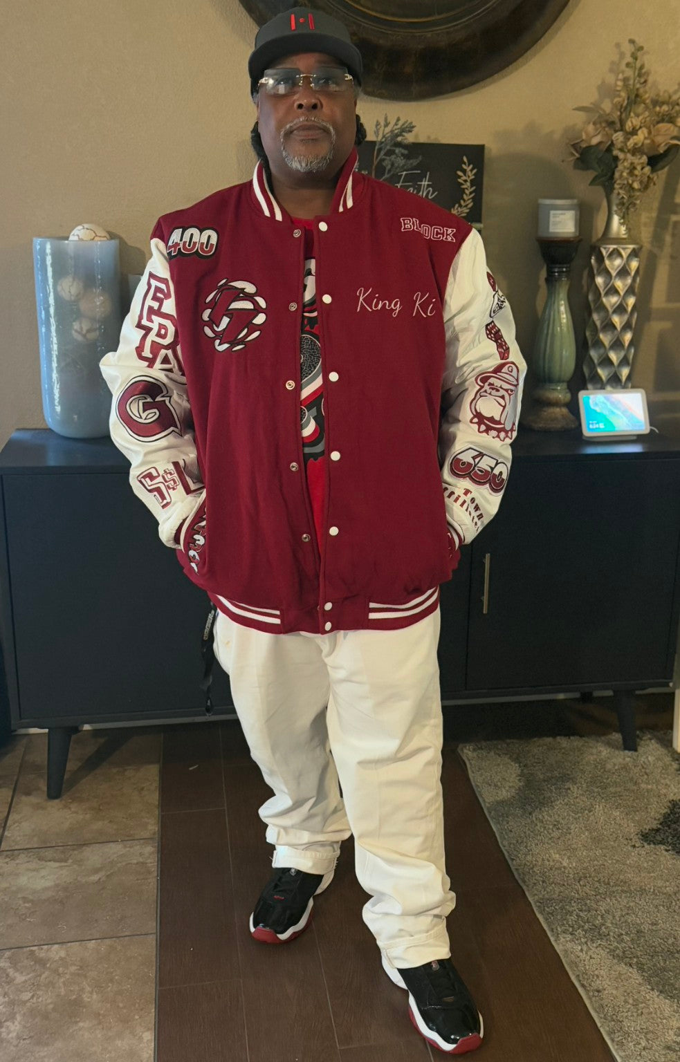 Elite One-of-One Example — finished Haw Eleven red and cream custom letterman jacket with matching Haw Eleven hat